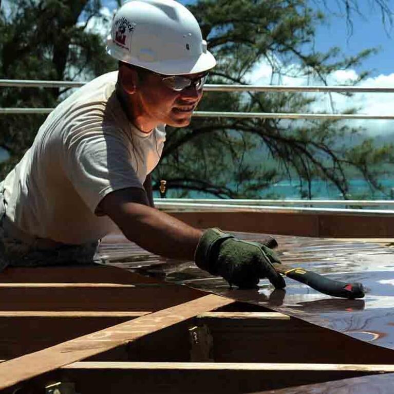 Construction workers on rooftop