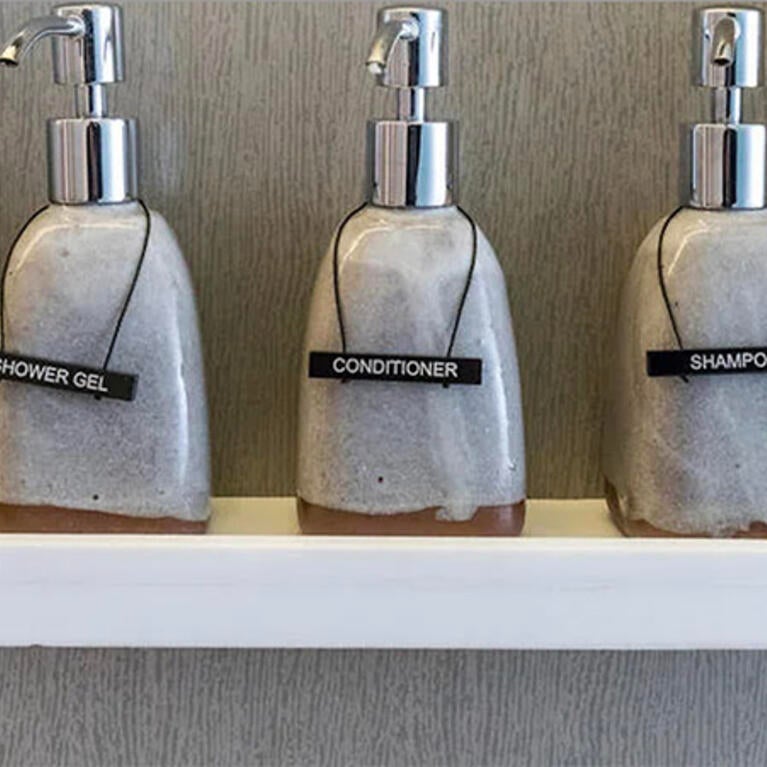 Hotel toiletries, shared bottles