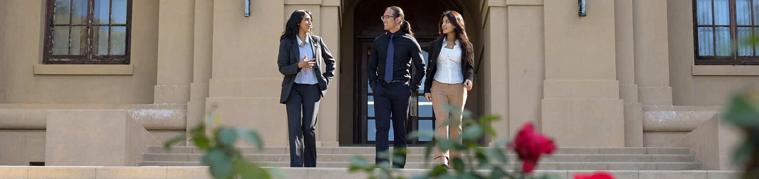 Business undergrad students on Anderson Hall stairs