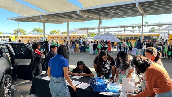 students at ecocars booth for stepcon 2023