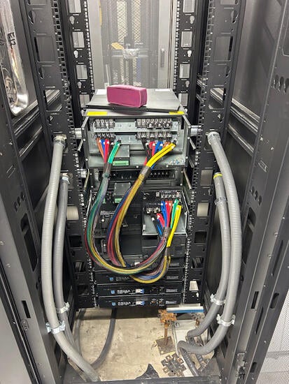 Cables coming out of a UPS