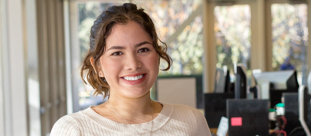 A UCR student uses the computers in the Highlander One-Stop Shop (HOSS).