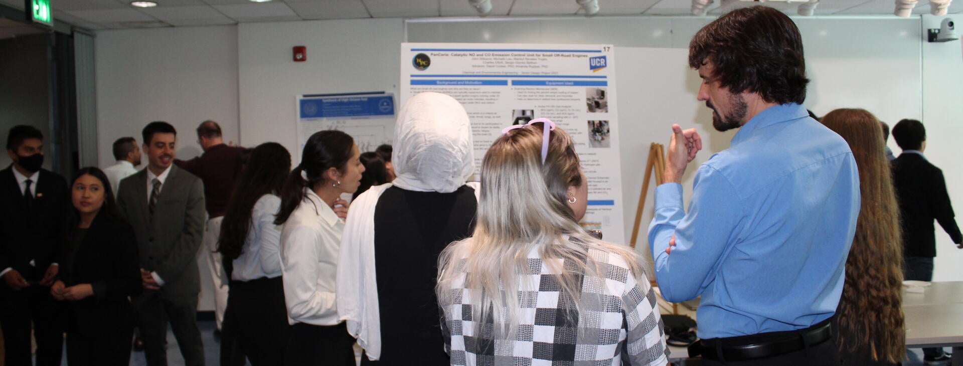 people at senior design symposium