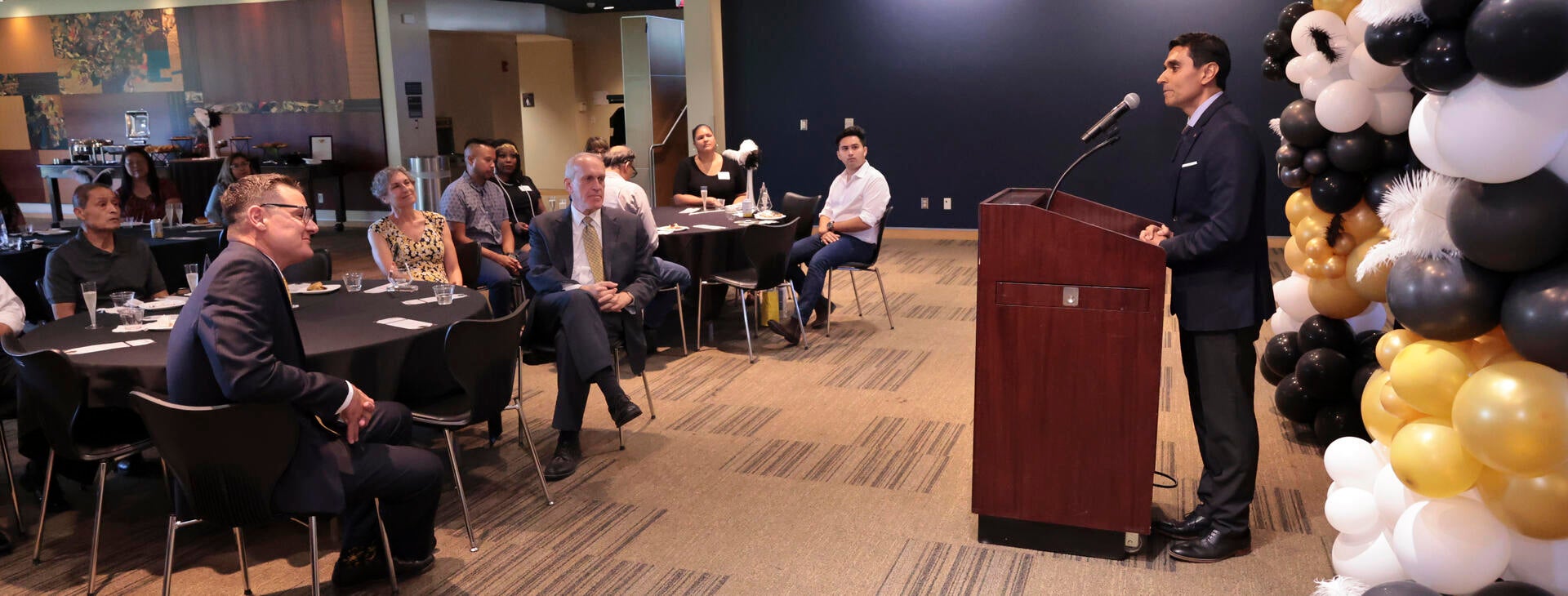 Incoming '22-'23 Staff Assembly President Agam Patel recognizes the '21-'22 President Jeff Girod at the 2022 Outstanding Staff Awards