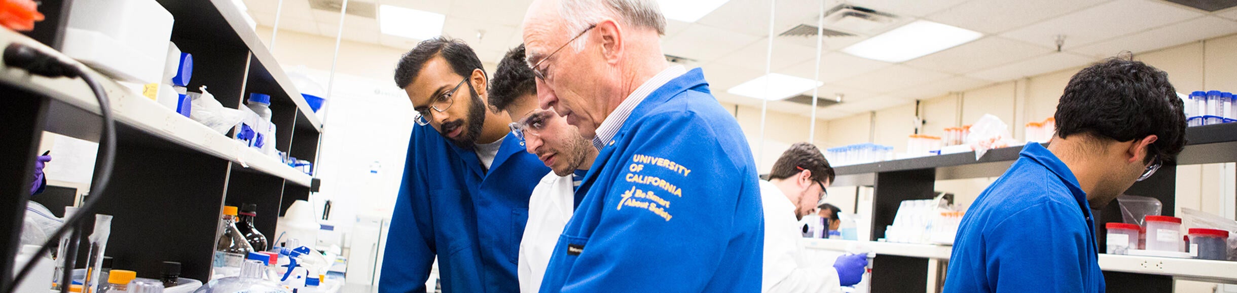 UCR Professor and students in a science lab (c) UCR/Stan Lim