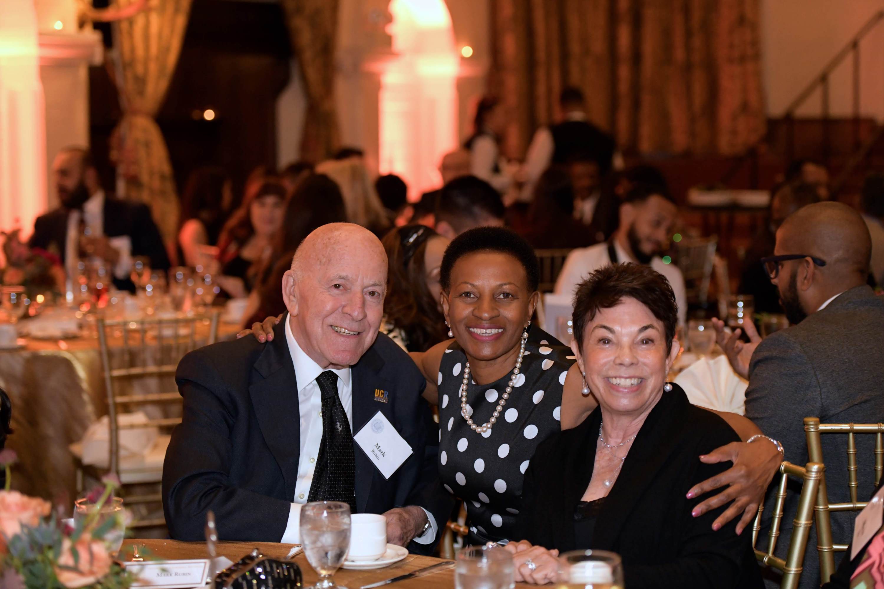 Dean Deborah Deas with Mark and Pam Rubin