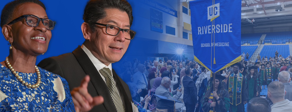 Deborah Deas and Pablo Joo in front of commencement