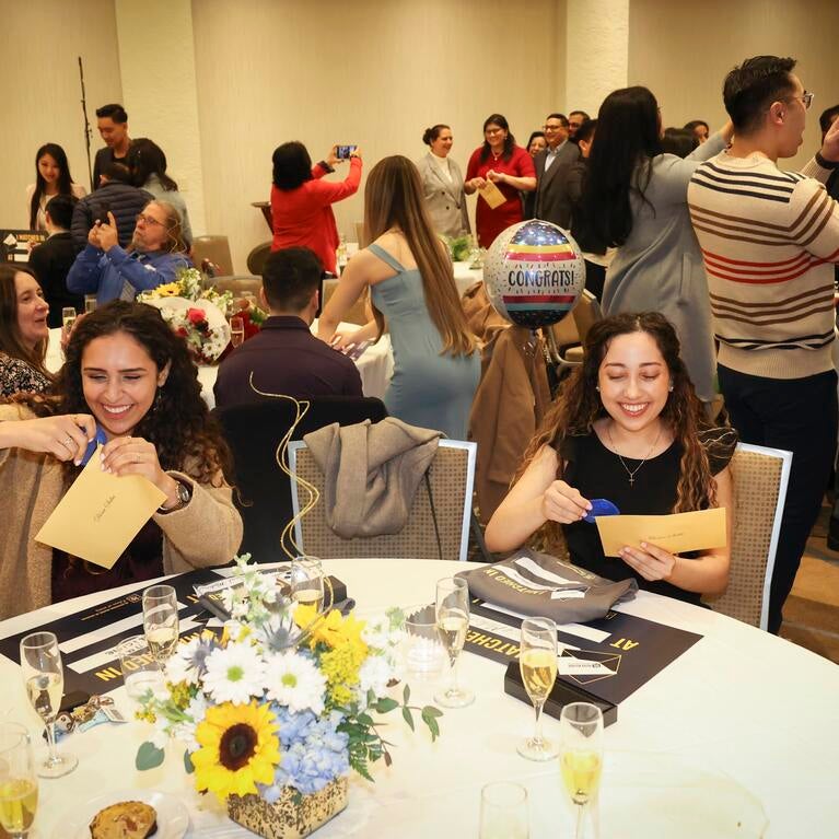 Students open their envelopes on Match Day 2023