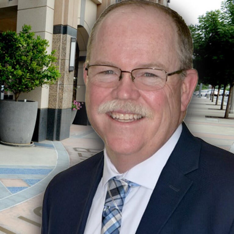 Tim Collins in front of the Citrus Tower lobby