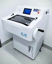 An image of the RWD Cryostat: a white machine