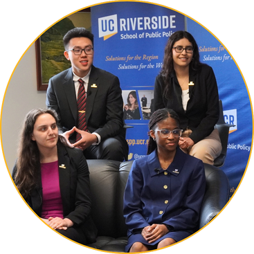 Four students in a podcast recording