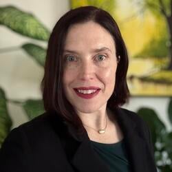 Katherine Browder, Assistant Dean, SI & Chief of Staff at UC Riverside, wearing a dark green blouse with a black blazer, smiling