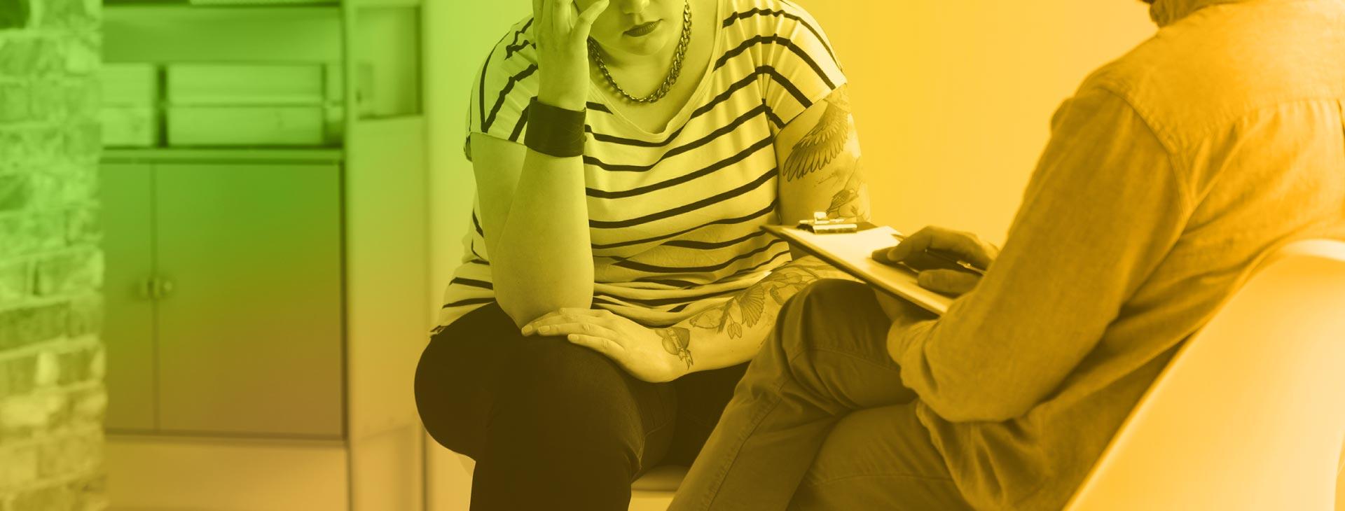 Distressed student talks with counselor.