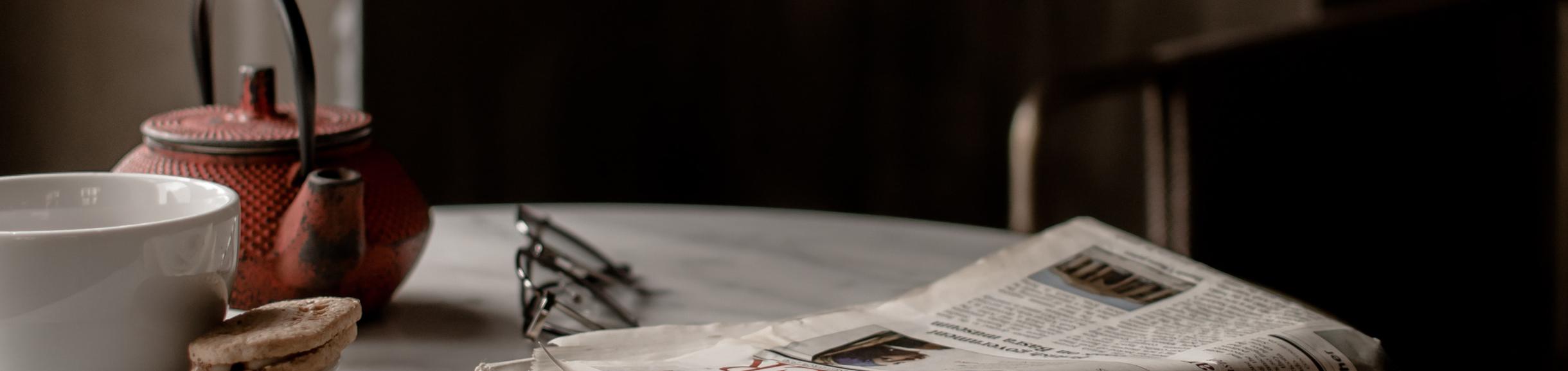 Newspaper and Table