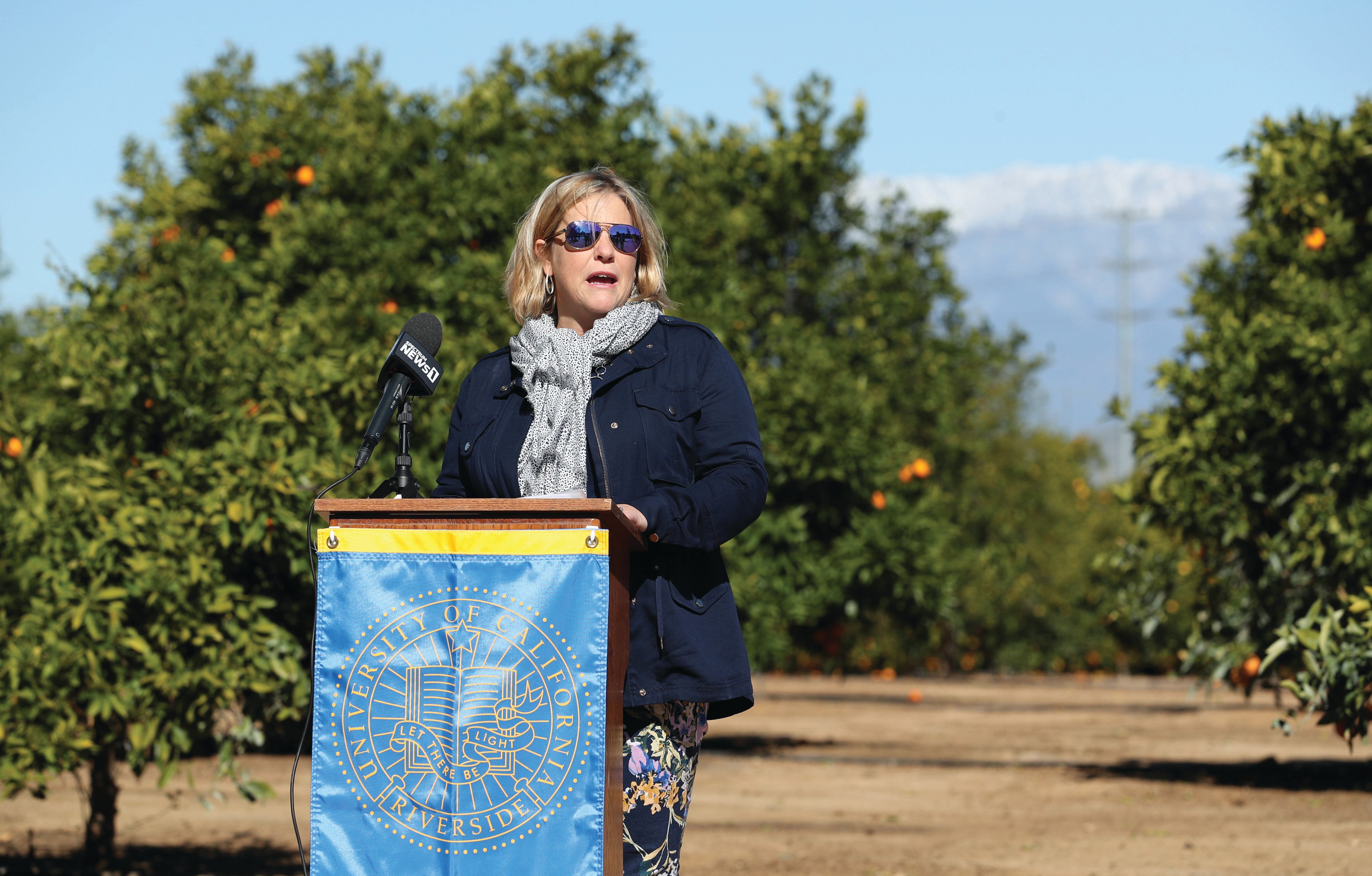 Givaudan’s Dawn Streich speaks at a press conference announcing the company’s $3.5 million donation in 2019.