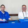 Sponsor representatives at their booth.