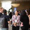 Attendees socializing with each other.