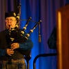 UC Riverside Pipe Band performing on stage.
