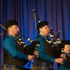 UC Riverside Pipe Band performing on stage.