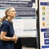 Attendee viewing the poster showcase.