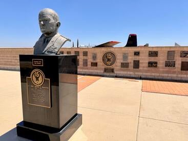 Heritage Courtyard at March Field Air Museum, featuring a head statue
