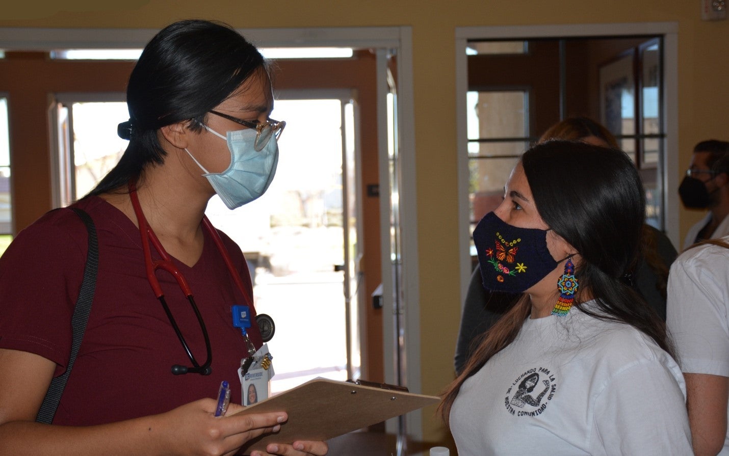 Students meeting with patients at Coachella Free Clinic in Mecca