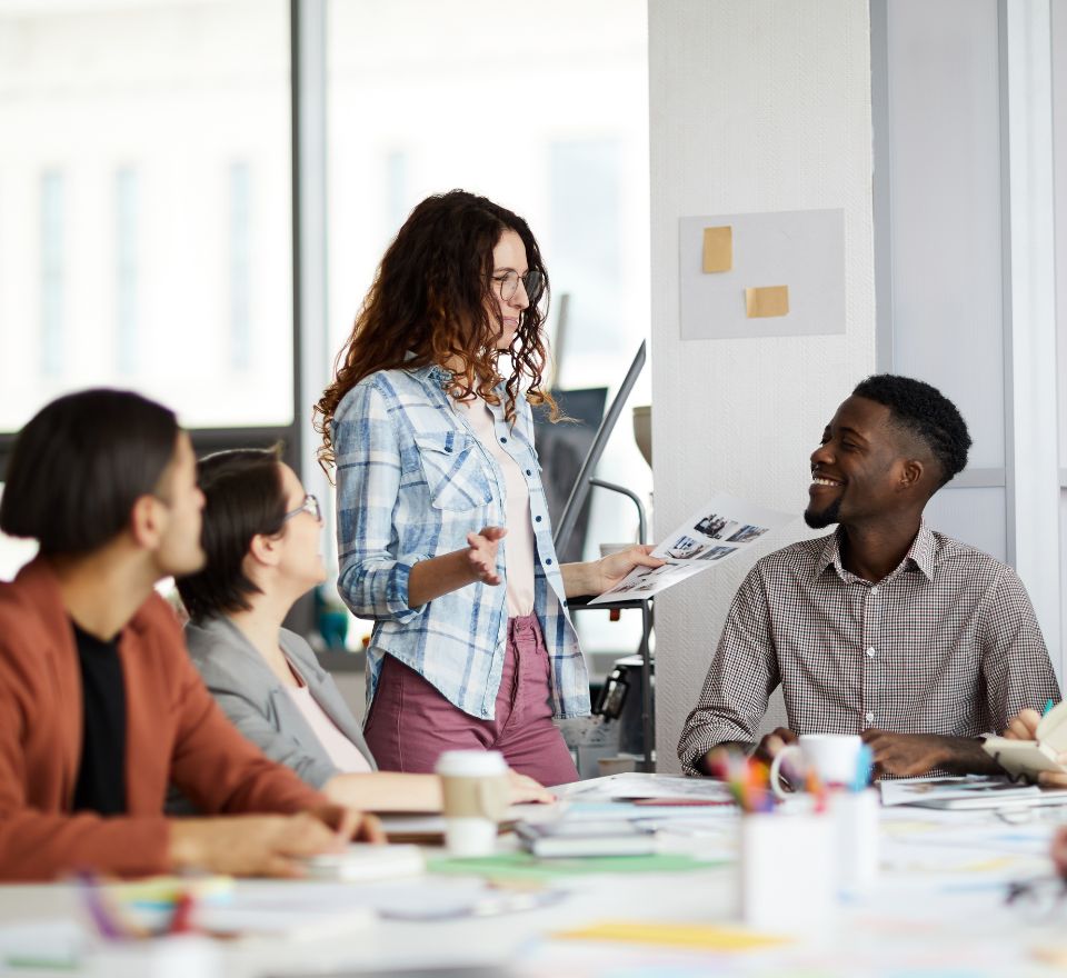 Group of students all looking at a peer present