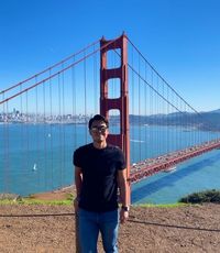 UCR University Extension student Leo Tomaya standing in front of the Golden Gate Bridge