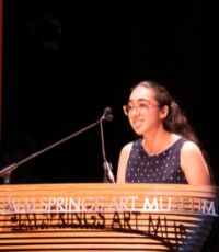 UCR University Extension alumni Ankita Ahluwalia giving a speech at the Palm Springs Art Museum