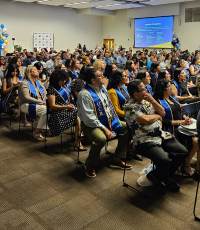 Students awaiting to be recognized at a certificate and program ceremony