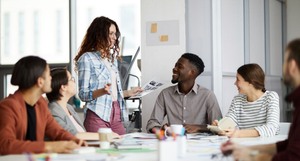 Group of students all looking at a peer present