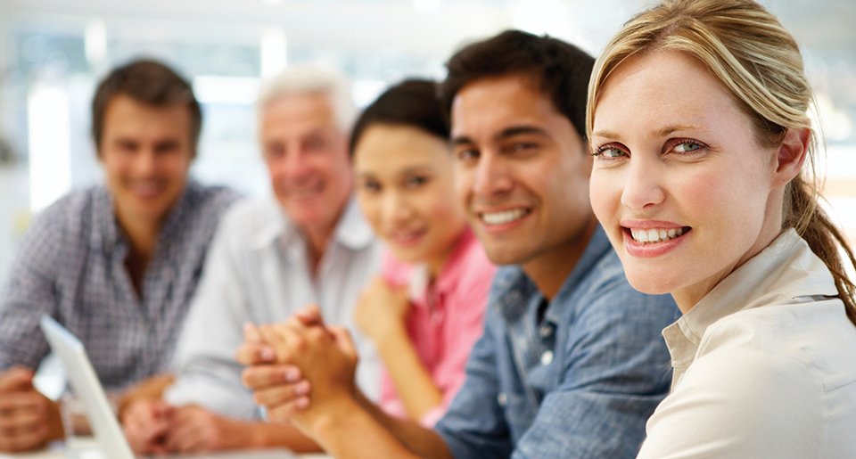 Close up of five diverse business people smiling