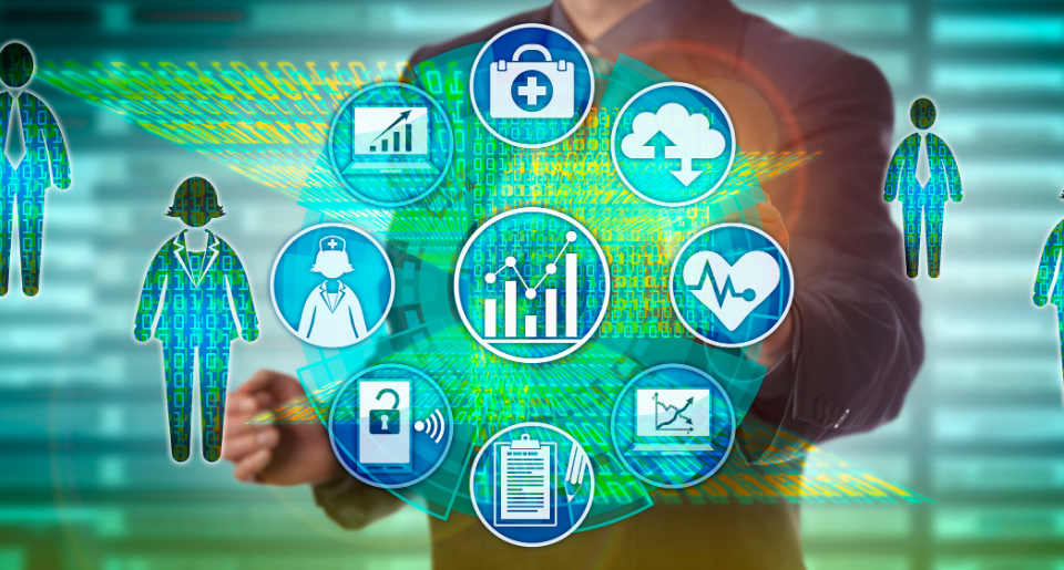 Businessman pointing at screen with healthcare analytics