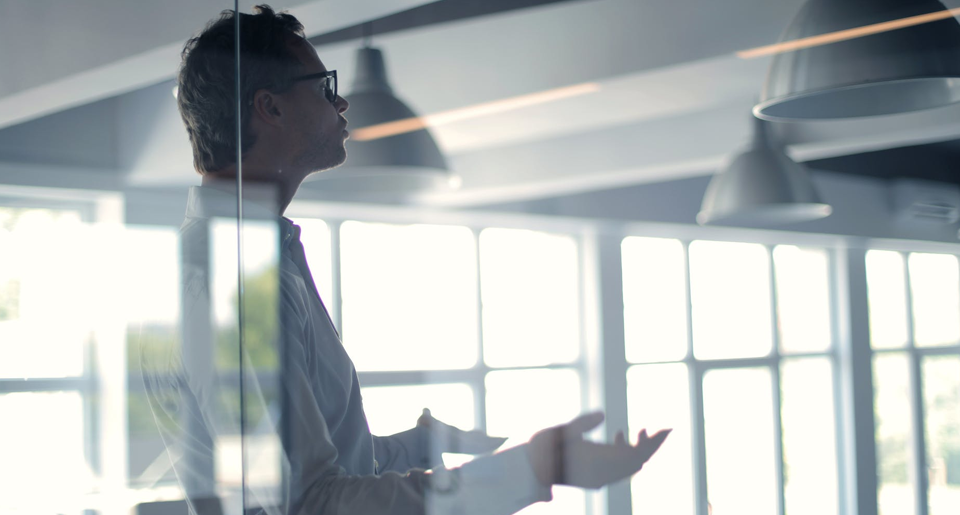 Business man in office inquiring about a project