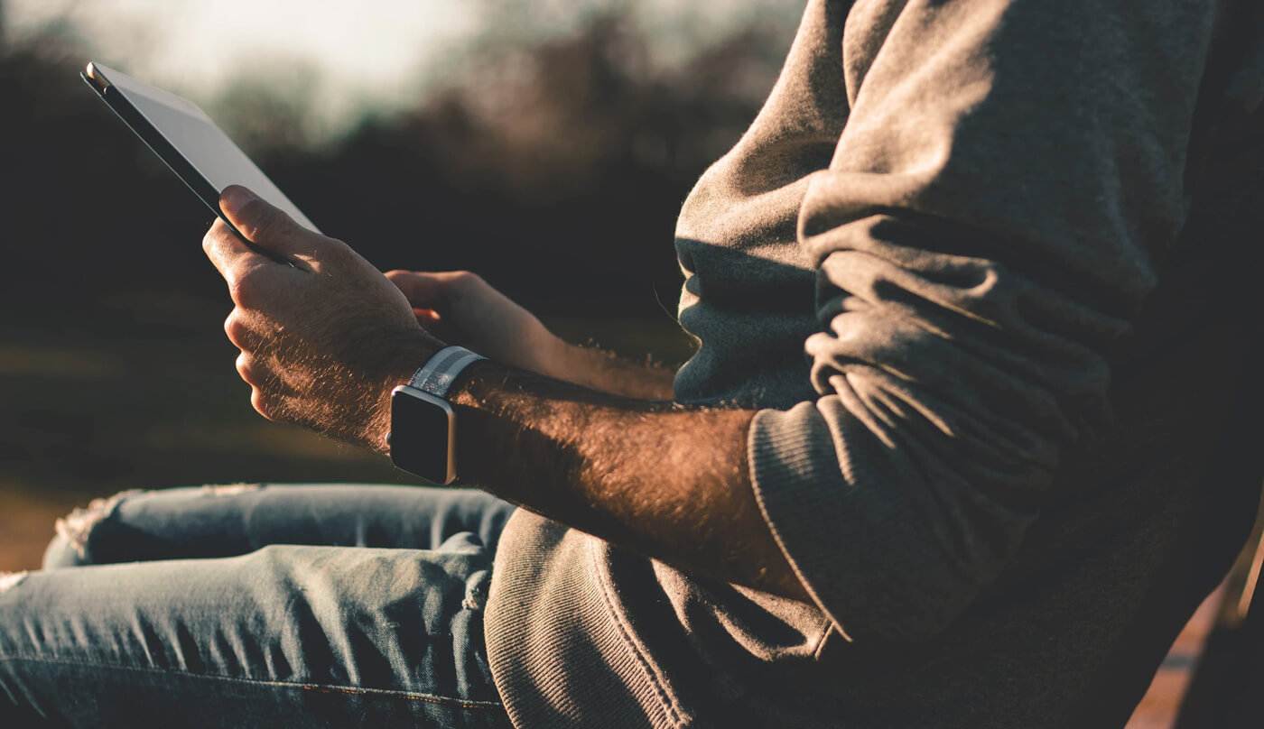 person holding tablet